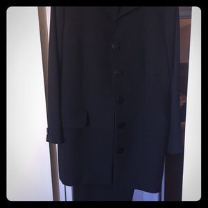 Women’s Yves Saint Laurent Black jacket and pants.